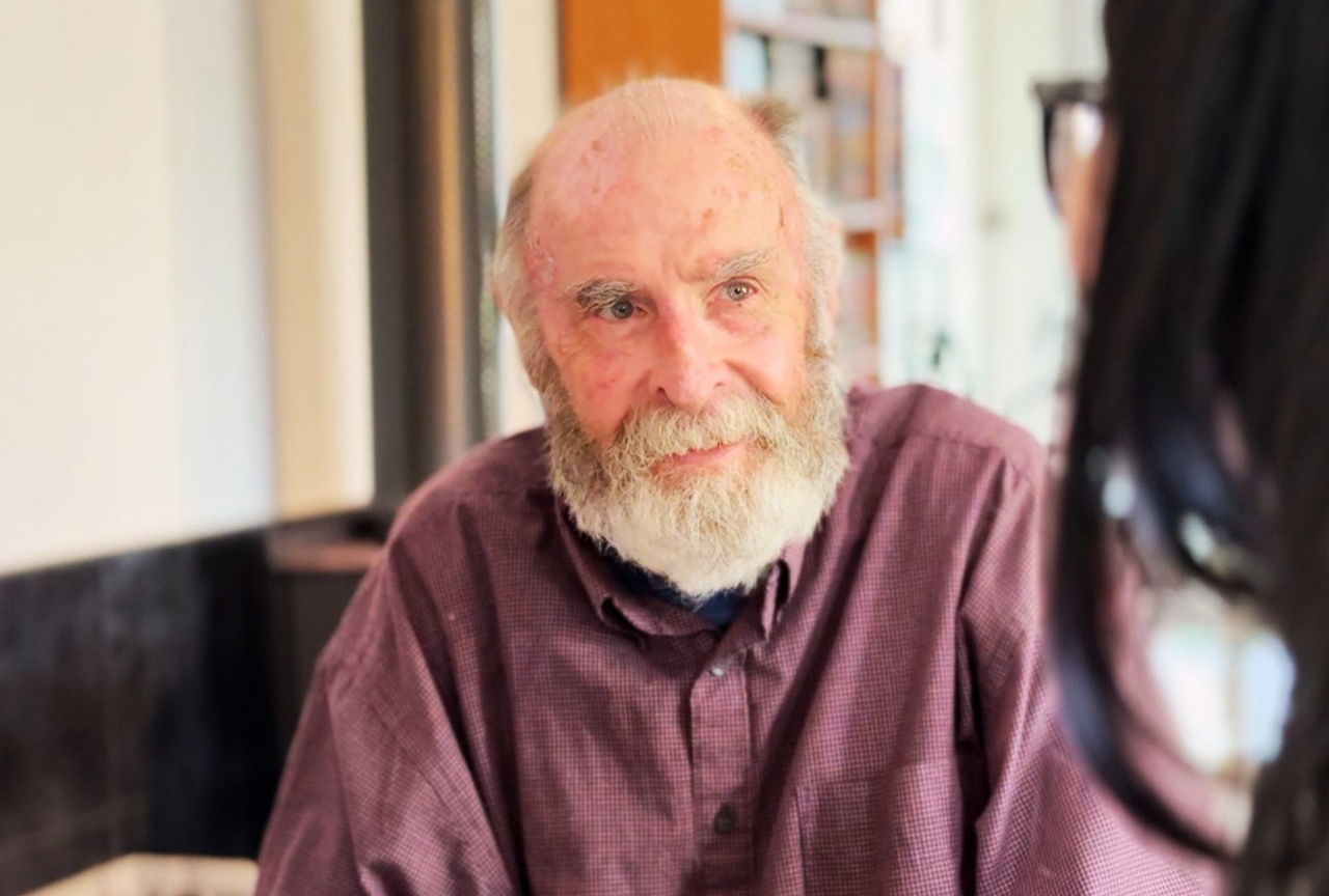 John Bell talking with his Aged Care support worker at home in Salamander Bay